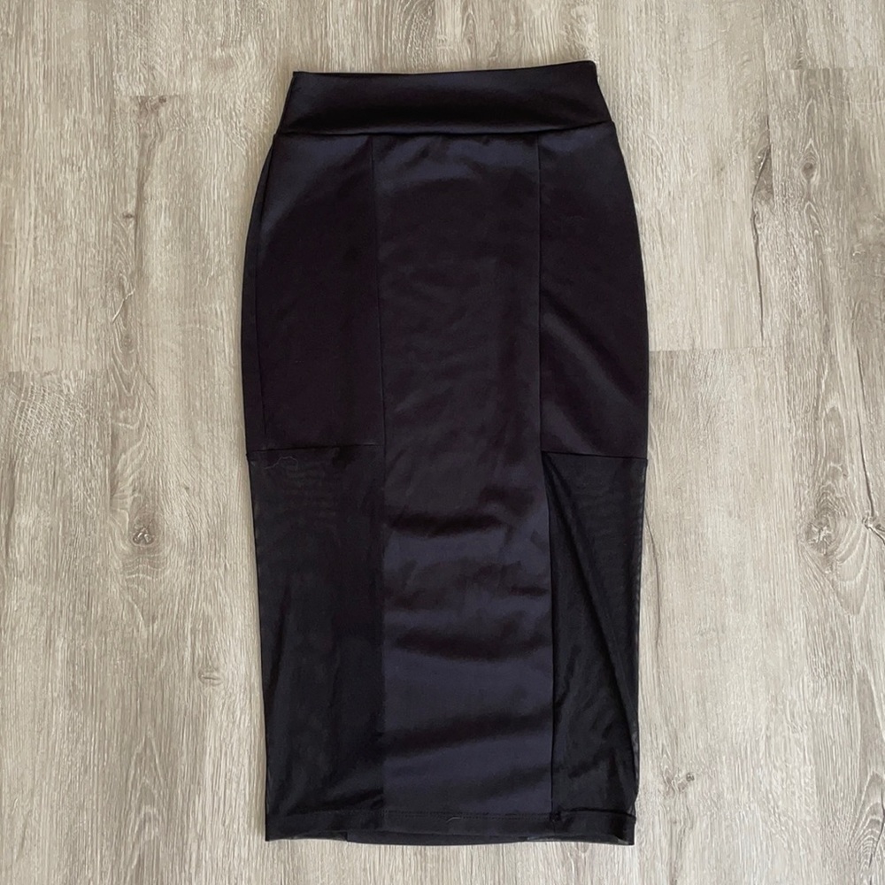 Black pencil skirt with sheer squares on the side